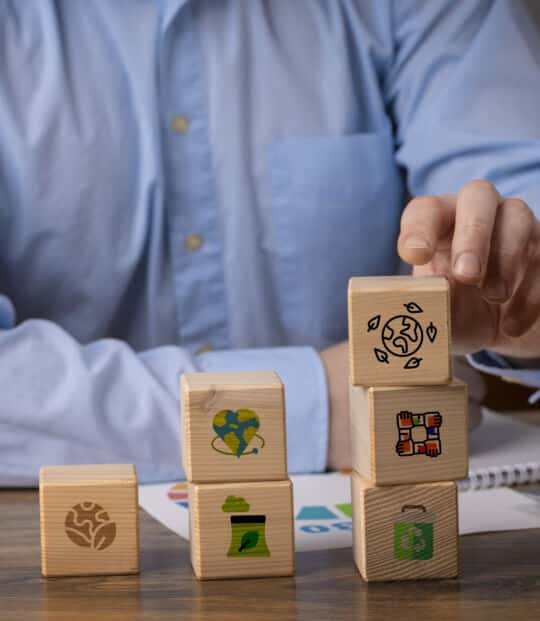 front-view-man-with-wooden-blocks