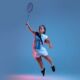 beautiful-dwarf-woman-practicing-badminton-isolated-blue-neon-light_155003-43888.jpg